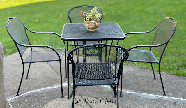 metal patio table with four chairs