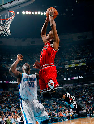 dwyane wade getting dunked on. D-Rose with the two-handed