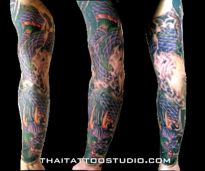 Full Sleeve Dragon Tattoo By Thai Studio 400x334px full sleeve lion tattoo