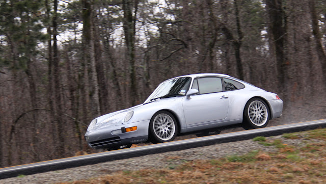 Silver Porsche 993 on Ozark National Forest Arkansas Highway 7.