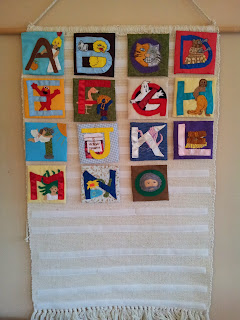 G[r]eek Alphabet wall hanging with the completely finished letters at that stage A - O