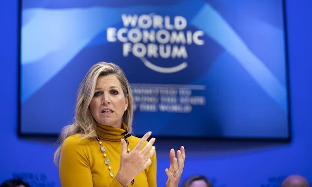 Queen Maxima wore a new Leandro yellow turtleneck sweater by Max Mara and Urlo yellow wide-leg trousers by Max Mara