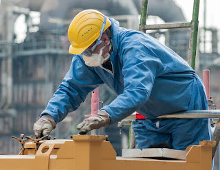 A German Worker Wearing a Mask with Valve photograph by CEphoto, Uwe Aranas