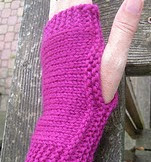 http://www.ravelry.com/patterns/library/easy-fingerless-mitts-3