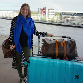 away from the blue Instagram | international flight style Striped duster olive jeans black tee louis vuitton scarf luggage