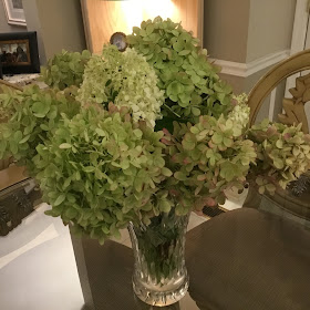 white hydrangeas in a crystal vase