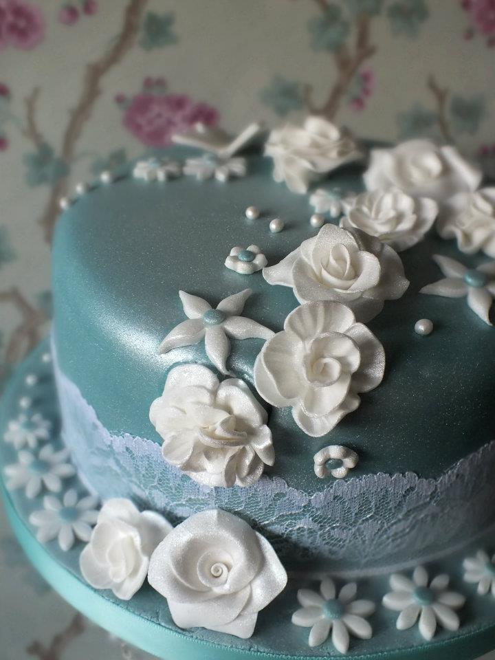 Ice Blue Wedding Cake with White Roses and Daiseys