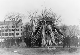 A black and white photograph of a bonfire that has not been lit yet.
