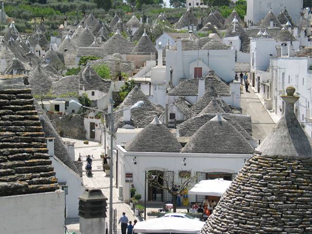 Alberobello, the city of drystone dwellings known as trulli , is an exceptional example of vernacular architecture. It is one of the best preserved and most homogeneous urban areas of this type in Europe. Its special features, and the fact that the buildings are still occupied, make it unique. It also represents a remarkable survival of prehistoric building techniques.