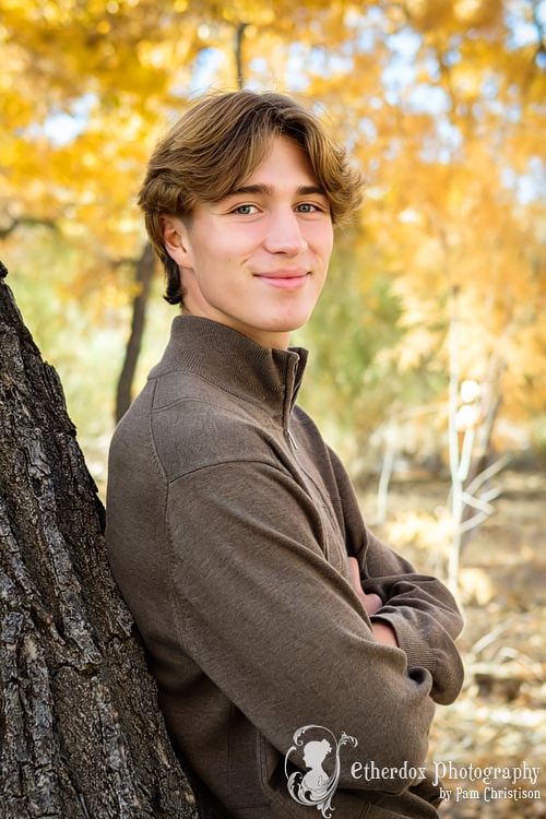 professional photo of a high school senior outdoor location bosque Albuquerque