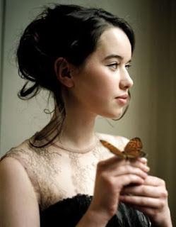 Anna Popplewell butterfly ring in finger