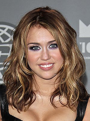 miley cyrus hairstyles 2011. Miley Cyrus showed off her new