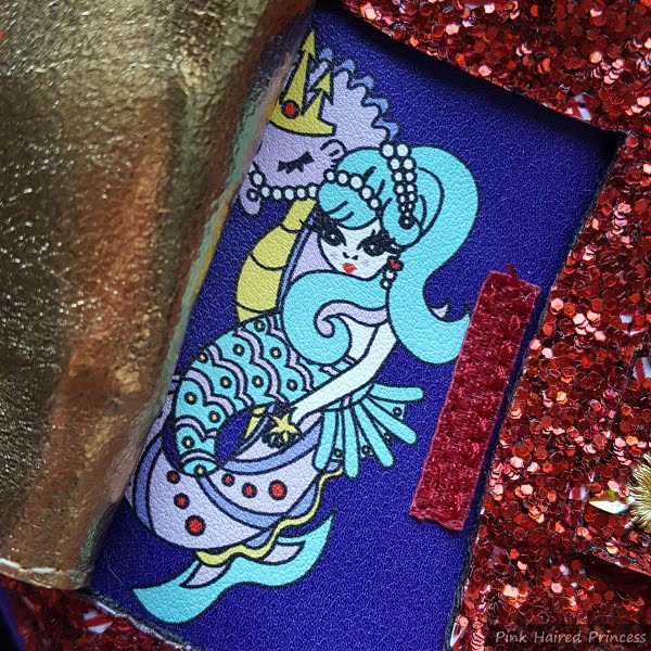 mermaid and seahorse image for day 11 of advent calendar boots