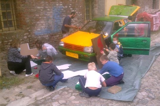 Kids working  on Magic Art Car