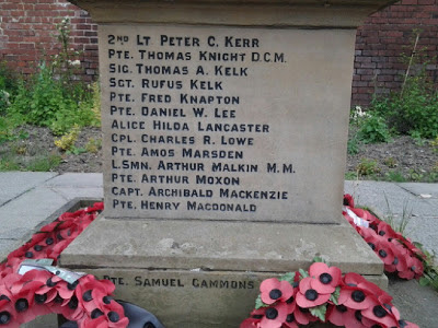 A close up of one side of a pillar base, showing names from K to Mac of the 1914-19 war dead.