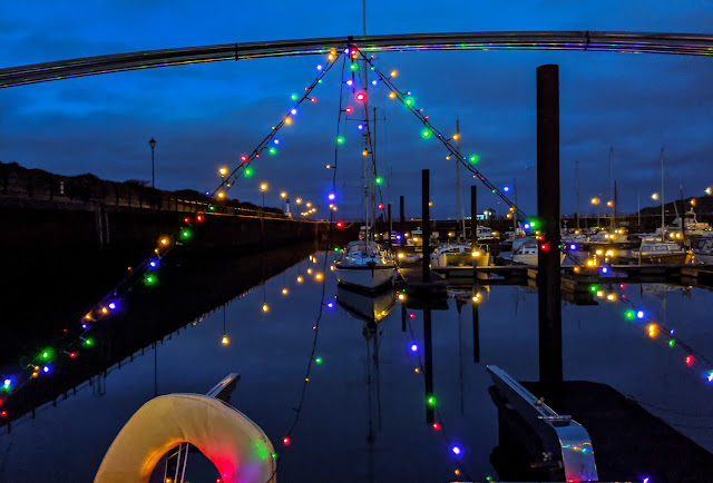 Photo of some of the colourful lights on Ravensdale's aft deck