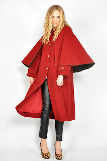 Vintage 1970's maxi length red military cape coat with green lining.