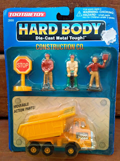 1:32nd Scale; 2855; 54mm; Blister Pack; Britains; Carded Toy; Civilian Figures; Construction Co.; Die Cast Metal; Driver Figures; Farm Toys; Hard Body; Movable Action Parts; New; Rack Toy; Rack Toy Month; Road Gang Construction Workers; Road Workers Roadworkers; RTM; Sitting Drivers; Small Scale World; smallscaleworld.blogspot.com; Tomy Toys Tomy-Takara; Toosietoy; Tootsietoy 2855; Tractor Drivers;