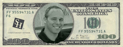 Dr. Buzzini photo in $100 bill.