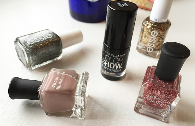 Glitter, pastels and stylish blacks for winter nails.