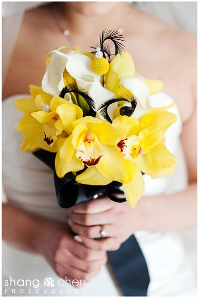 Yellow calla yellow orchids and white and pink orchid bridal bouquet