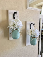 Floreros para decorar el hogar hechos con frascos de vidrio reutilizados
