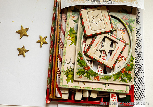 Layers of ink - Double-stamped Santa Tag Tutorial by Anna-Karin Evaldsson. Gold emboss the stars.