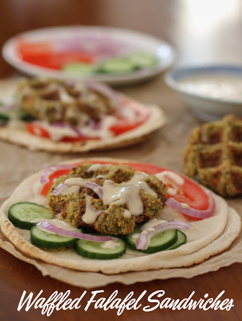 Food Lust People Love: Waffled falafel sandwiches are made by cooking your homemade falafel mix in a lightly oiled waffle iron which gets the falafels crispy outside and fluffy inside without frying. Stuff them in flatbread, drizzled with tahini sauce.