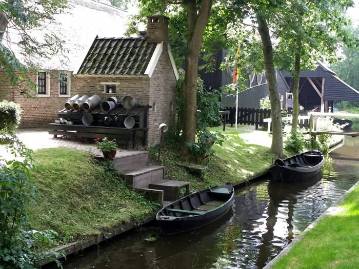 Can you imagine a village with no roads? There is such a place in the Netherlands called Giethoorn (pronounced 'geethorn'). There are no roads and cars have to remain outside the village. The only access to the stunningly lovely houses in Giethoorn is by water, or on foot over tiny individual wooden bridges.