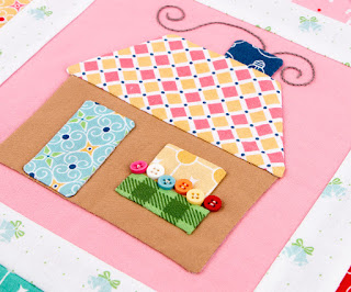 http://www.fatquartershop.com/cozy-christmas-quilt-kit