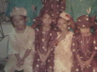 OLD SCHOOL FAMILY PICTURE OF TONTO DIKE WITH HER SIBLINGS!!!