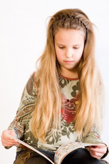 A girl reading a book