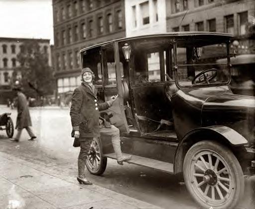 Woman taxi driver. 1919