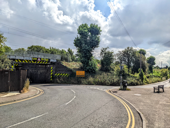 Head S on Gun Lane, with the railway on your left