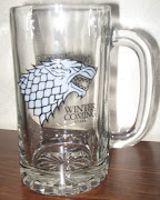 This is the House Stark mug. One side features a direwolf and says Winter's . (img )