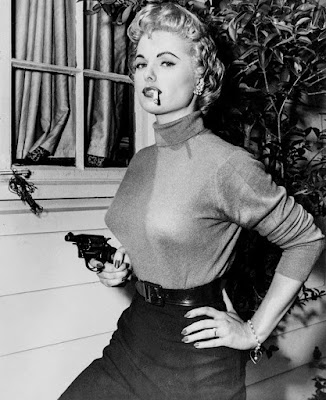 Martha Hyer with a gun