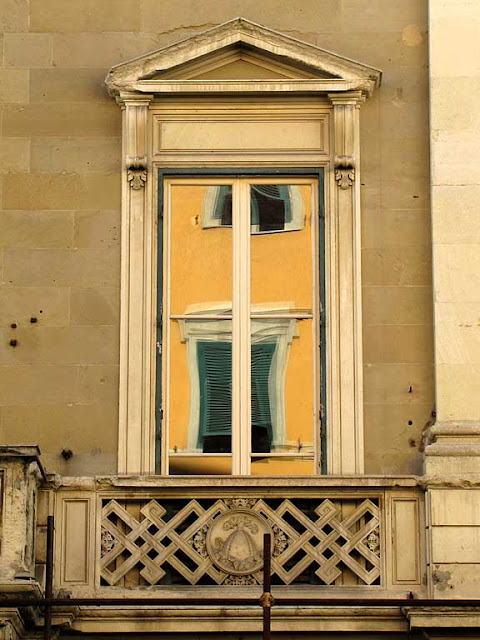 Windows reflected in a window, Palazzo de Larderel, via de Larderel, Livorno