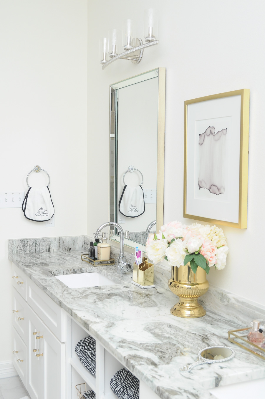 gold and white bathroom tiles