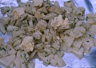 raw potatoes in foil