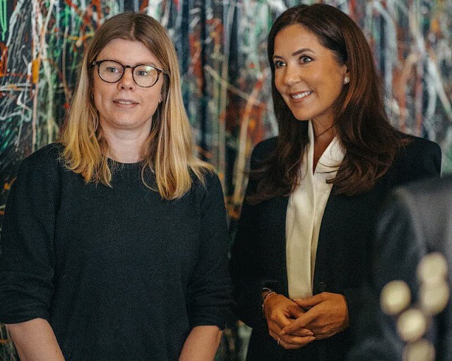 Crown Princess Mary attended a launch of the Mary Foundation. White silk blouse
