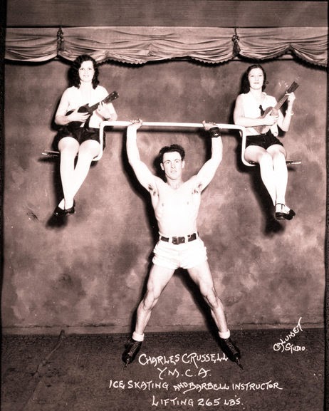 Ripley's Believe it Or Not photograph of Charles C. Russell weightlifting wearing a pair of skates