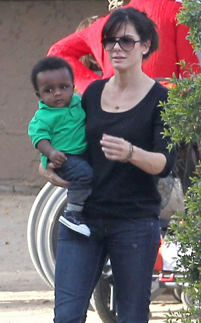 Sandra Bullock and her son Louis Bullock attending a Christmas Party in Santa Monica