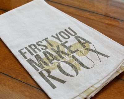 Kitchen Towel that reads First Make a Roux
