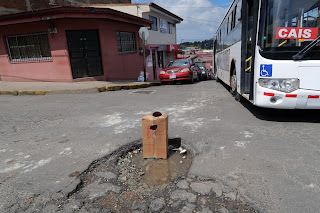 Large pothole on street in Puriscal.