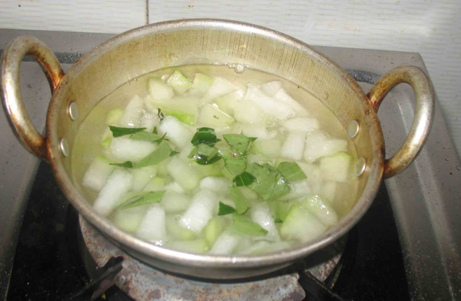 to curry the a with water buttermilk  Boil cup how make of chopped and Ash curry leaves gourd