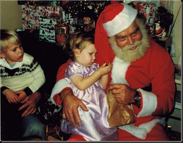 Lisa Marie Durnan checking Santa Claus out. Chad Kane on the left