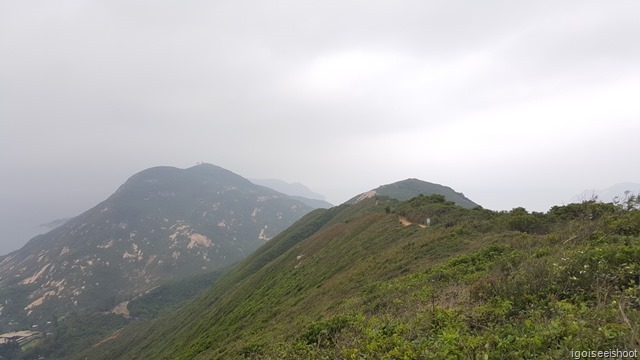 Walking on the Dragon’s Back Trail in Hong Kong. undulating rolling path on the ridge that gave the trail its name.