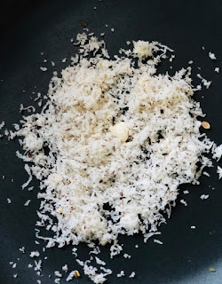 Roast grated dry coconut