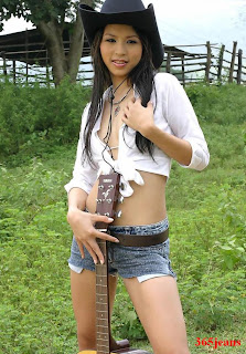 the wearing denim shorts girl play the guitar