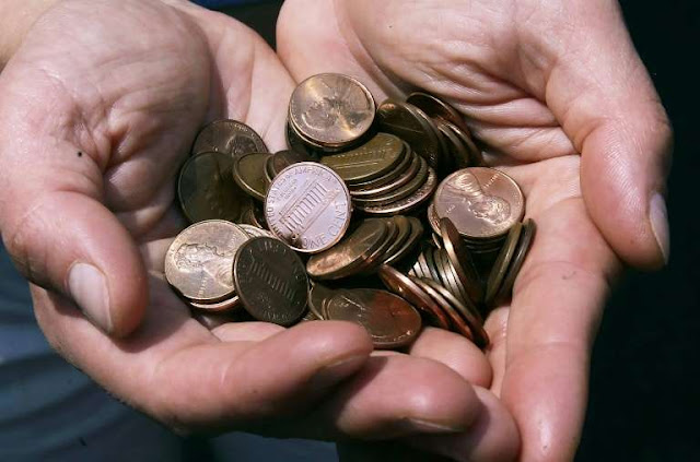 Time to change: Virus-hit US urges people to spend coins